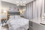 Second bedroom renders a queen-sized, memory foam mattress